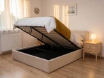 Čalouněná postel s úložným prostorem 180×200 cm Tilo Velvet – béžová