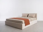 Čalouněná postel s úložným prostorem 180×200 cm Tilo Velvet – béžová