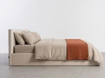 Čalouněná postel s úložným prostorem 180×200 cm Tilo Velvet – béžová